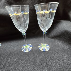 Elegant Crystal Wine Glasses with Blue and Yellow Accents